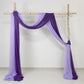 Purple sheer backdrop drape for wedding arch and ceiling decor.