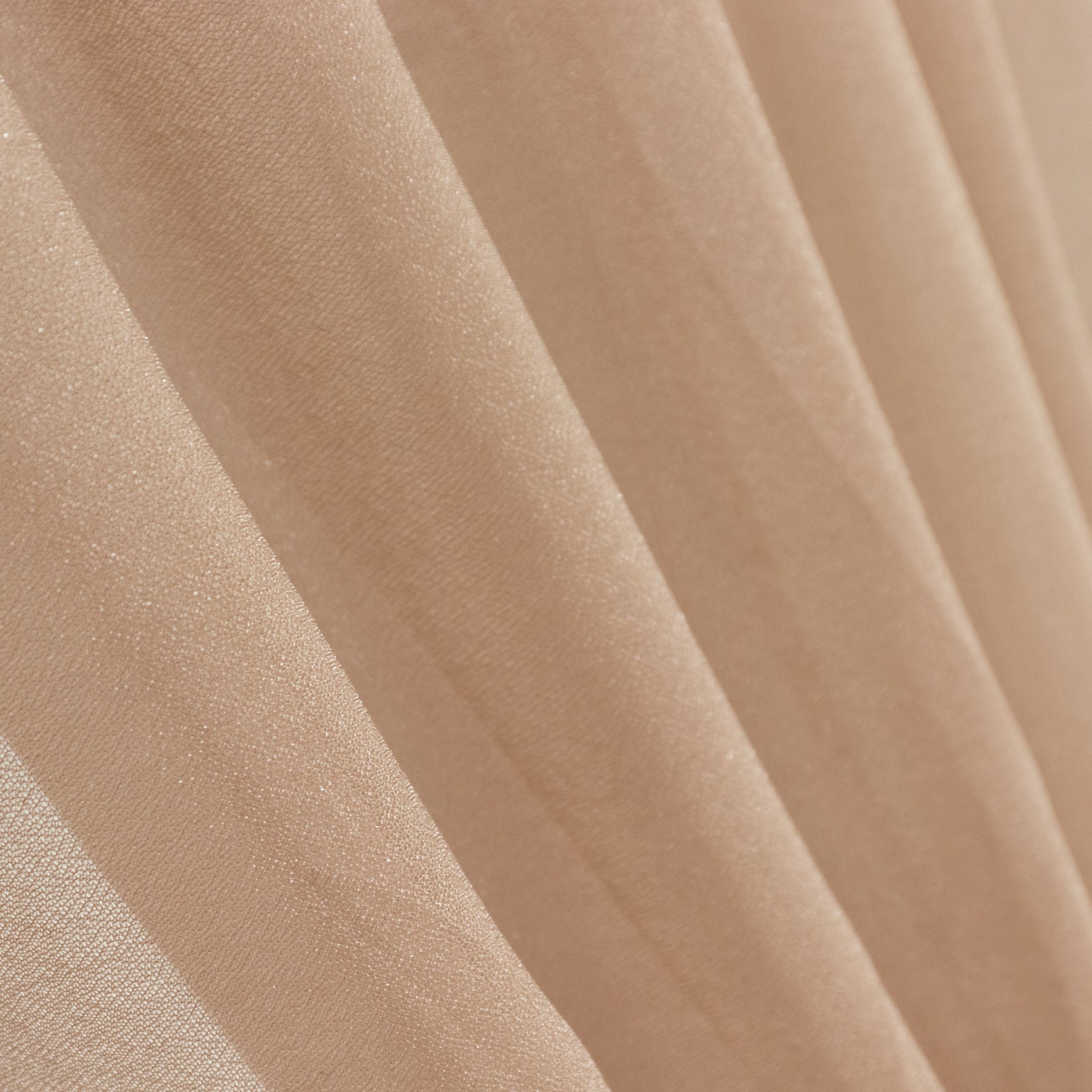 Taupe sheer backdrop drape with soft shimmer, ideal for wedding decor.
