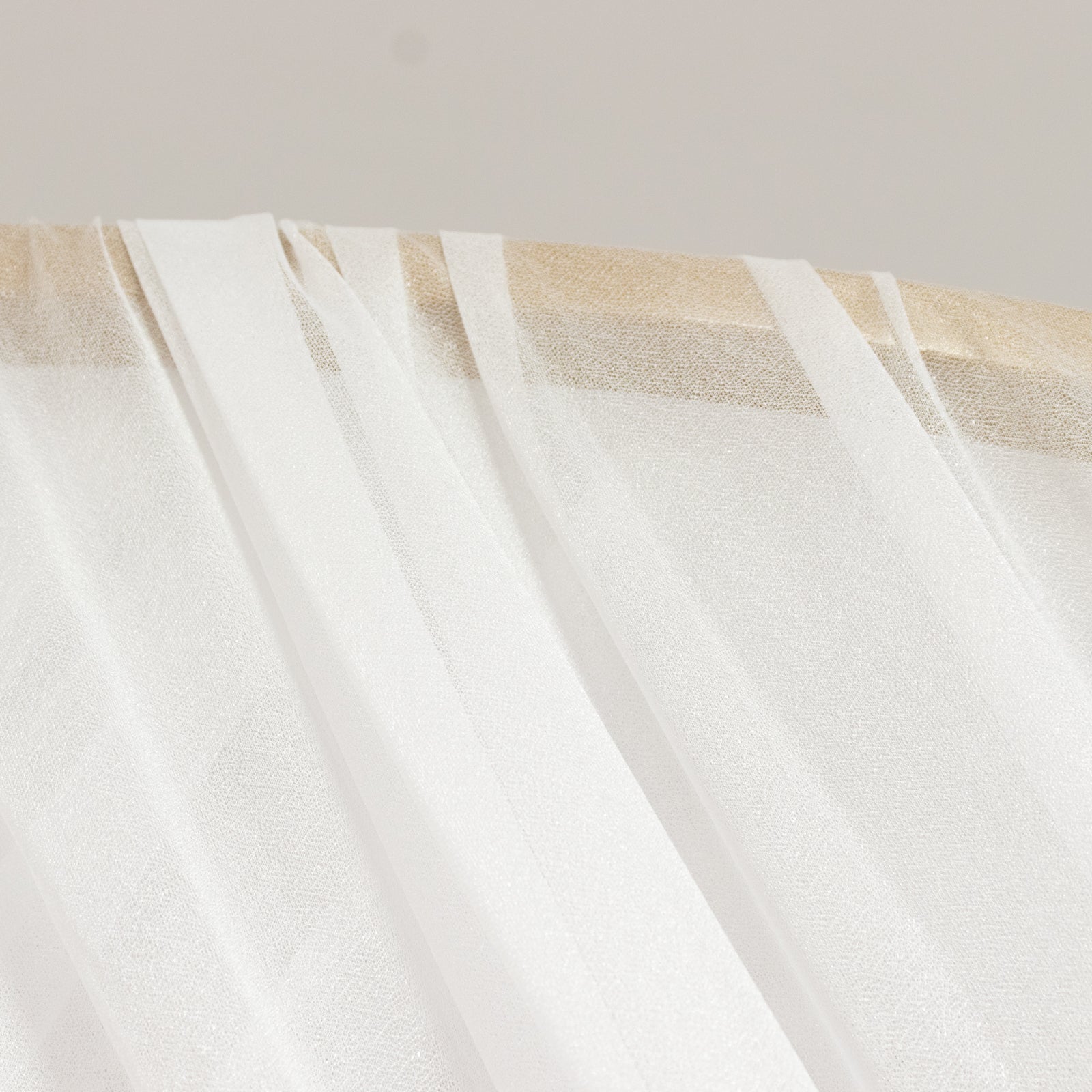 White sheer backdrop drape for wedding arch and ceiling decor.