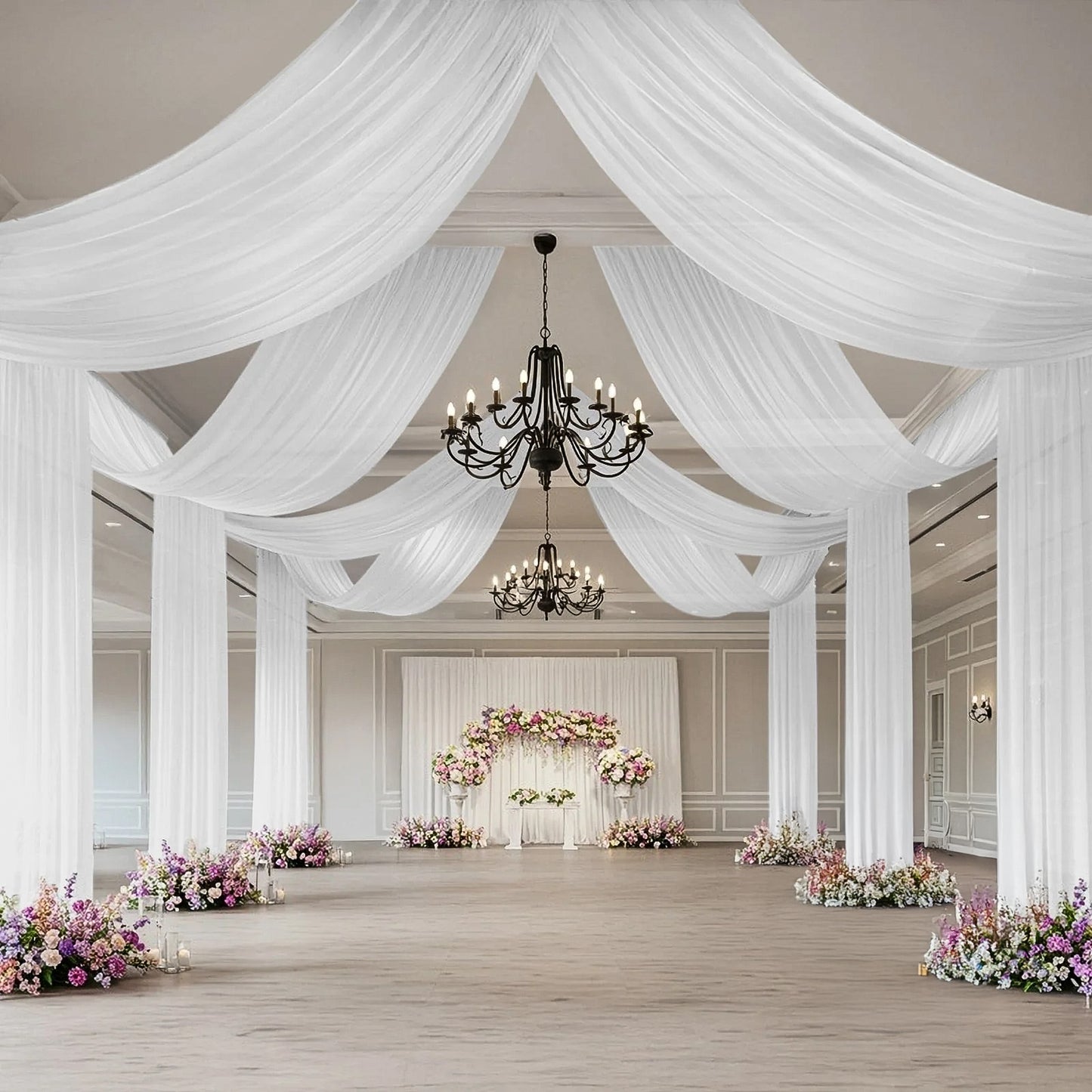 White sheer backdrop drape for wedding arch and ceiling decor.