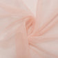 Blush sheer backdrop curtain panel for wedding arch draping.