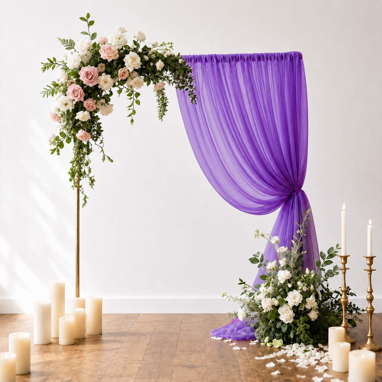 Purple sheer backdrop curtain panel draping elegantly in a wedding setup.