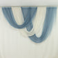 Dusty blue sheer chiffon backdrop valance drapes with curved swag design.