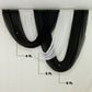 Black sheer chiffon backdrop valance with curved swag design.