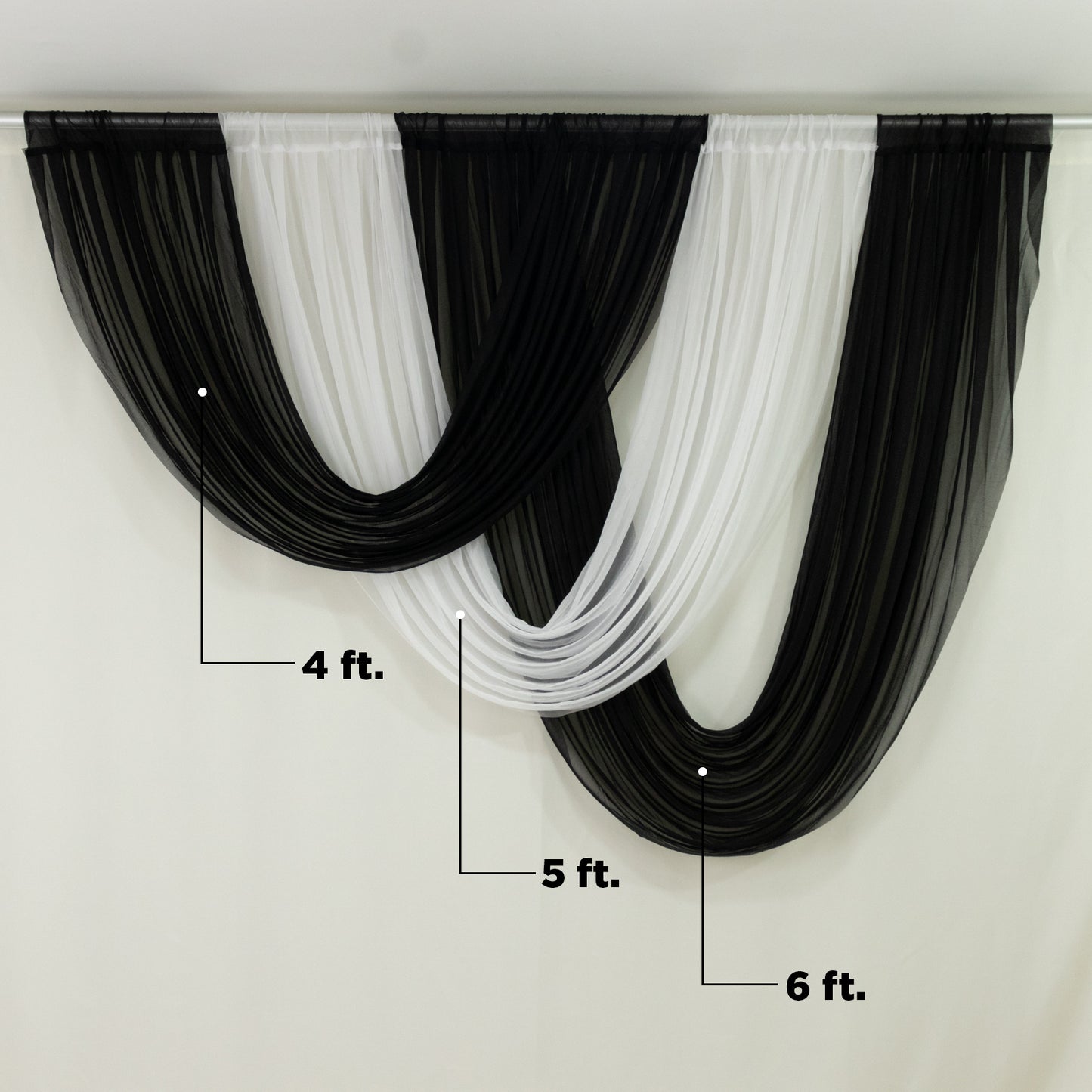 Black sheer chiffon backdrop valance with curved swag design.