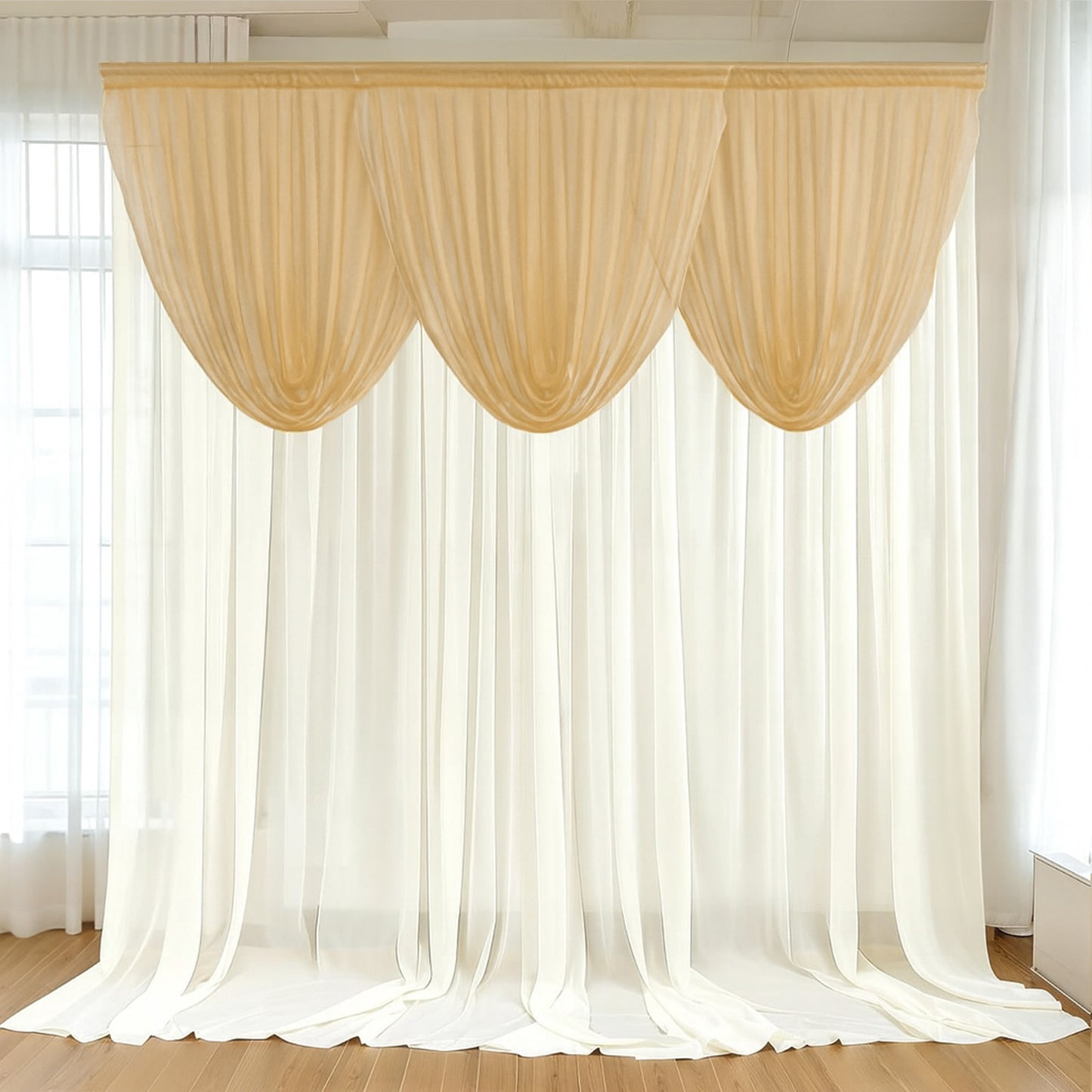 Champagne sheer chiffon backdrop valance drapes with curved swag topper.