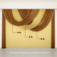 Gold sheer chiffon backdrop valance drapes with curved swag topper panel.