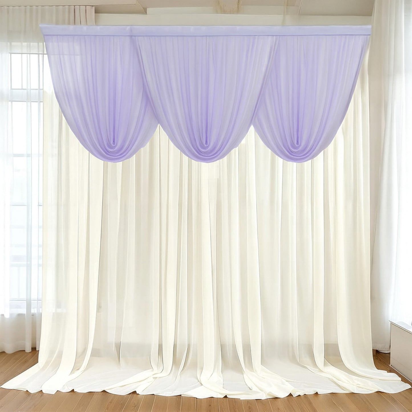 Lavender lilac sheer chiffon backdrop valance drapes in a curved swag design.