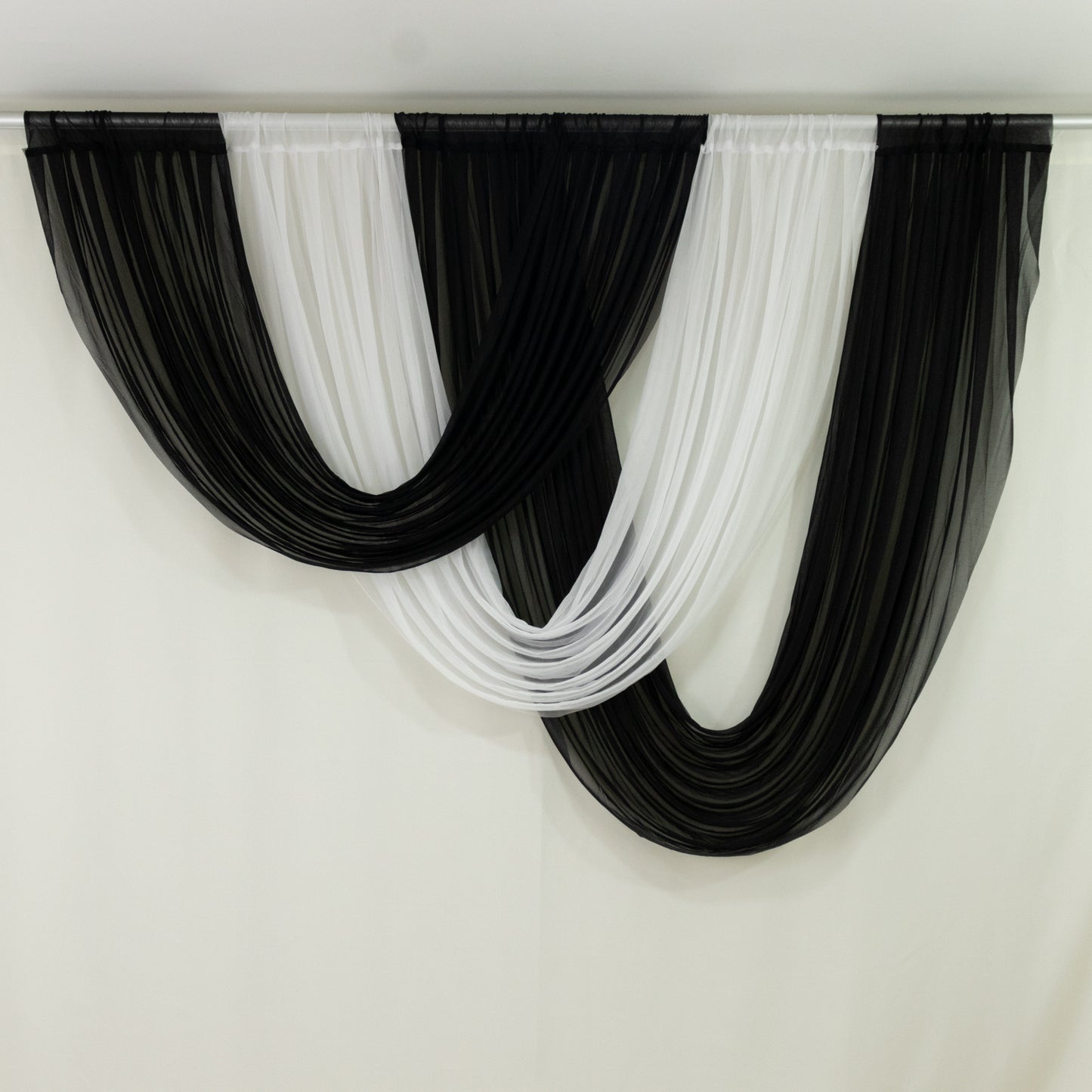 Black and white sheer chiffon backdrop valance drapes.
