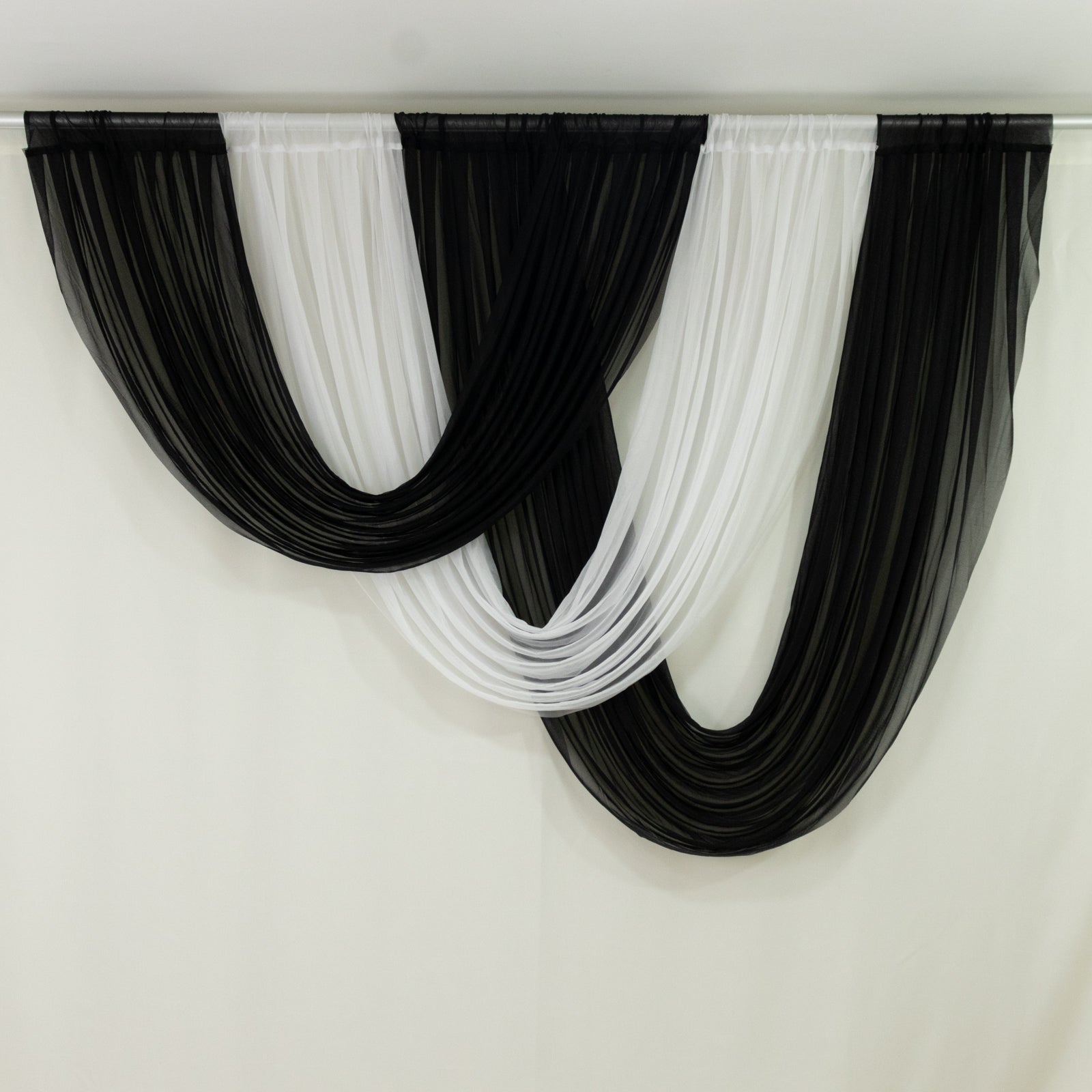 Black and white sheer chiffon backdrop valance drapes.