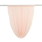 Blush sheer chiffon valance curtain draped elegantly on a rod.