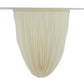 Beige sheer chiffon valance curtain draped elegantly.
