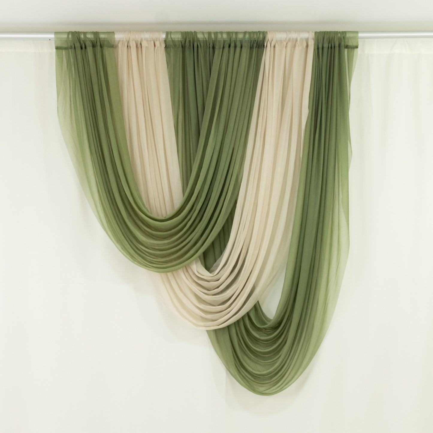 Beige Sheer Chiffon Valance Curtain draped with green accents.