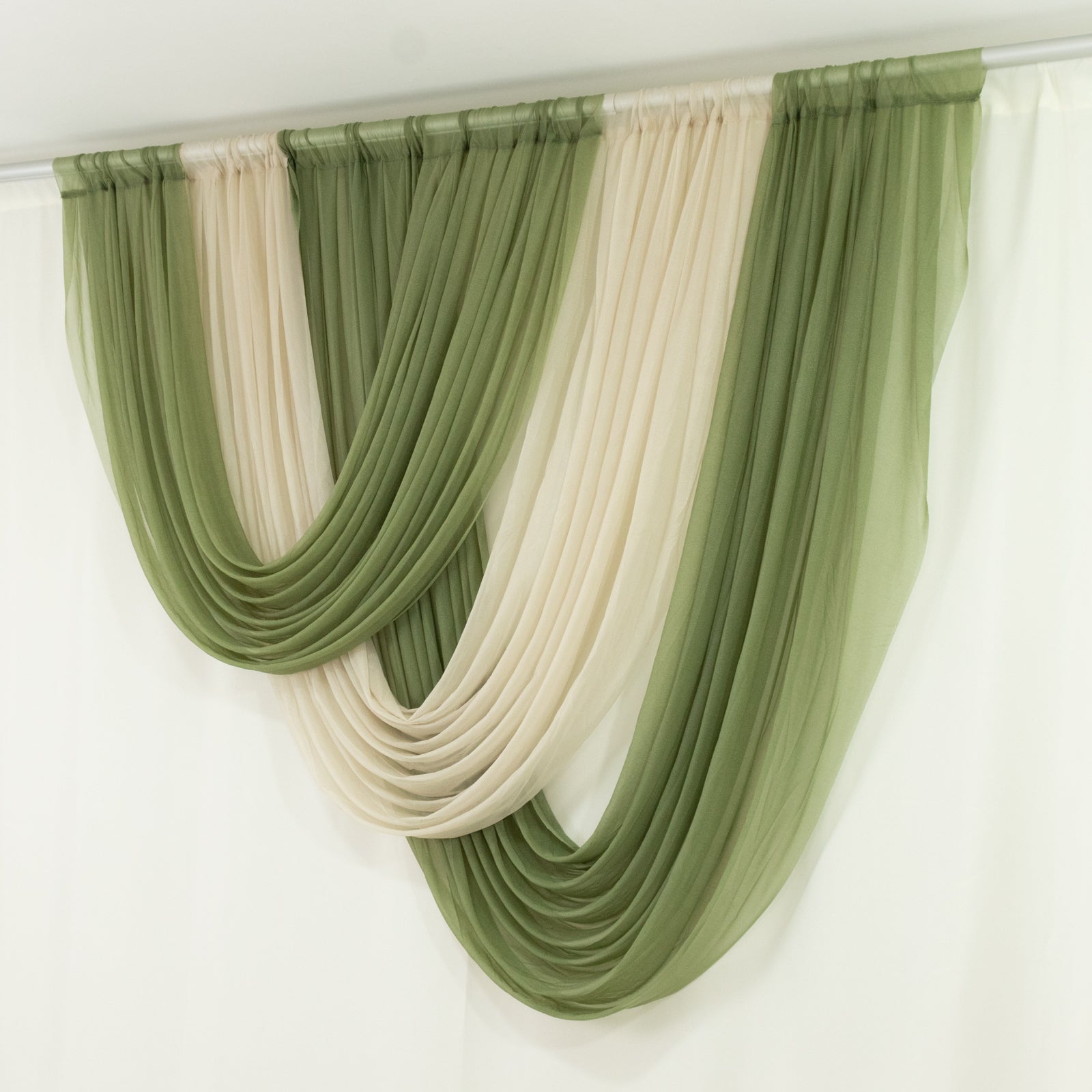 Beige sheer chiffon valance curtain draped elegantly in soft green.