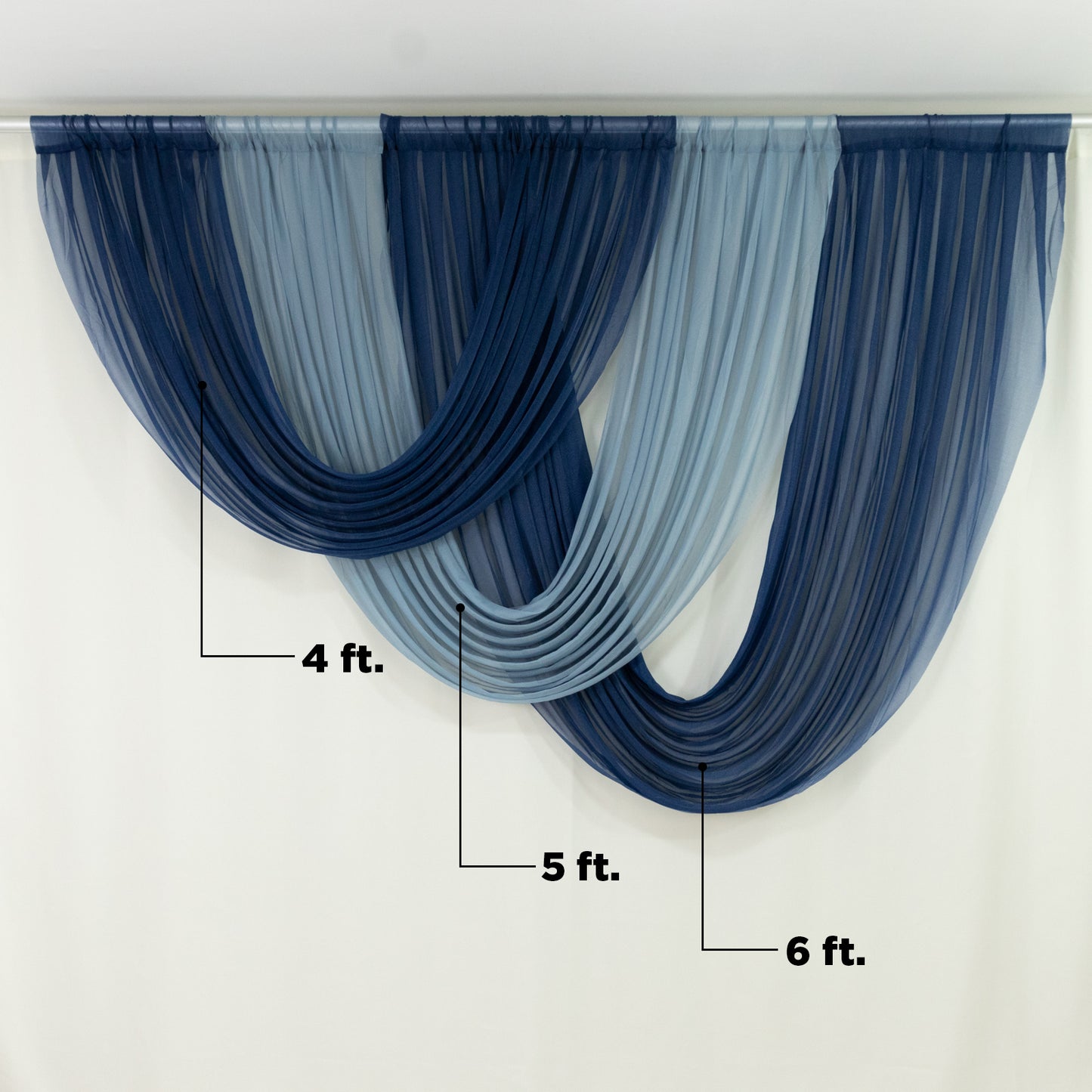Dusty blue sheer chiffon valance curtain draped elegantly.