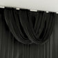 Black sheer chiffon valance curtain draped elegantly.