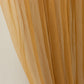Gold sheer chiffon valance curtain drape for wedding arch backdrop.
