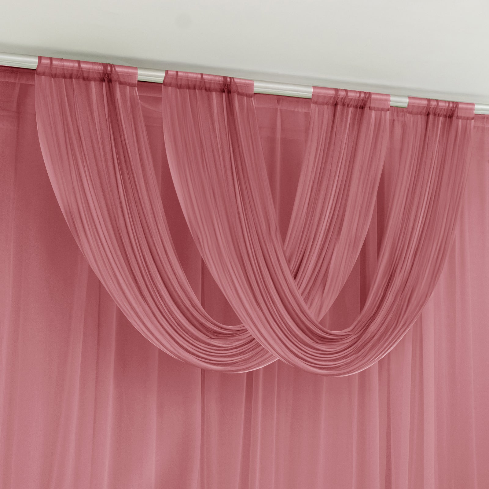 Mauve sheer chiffon valance curtain draped elegantly.