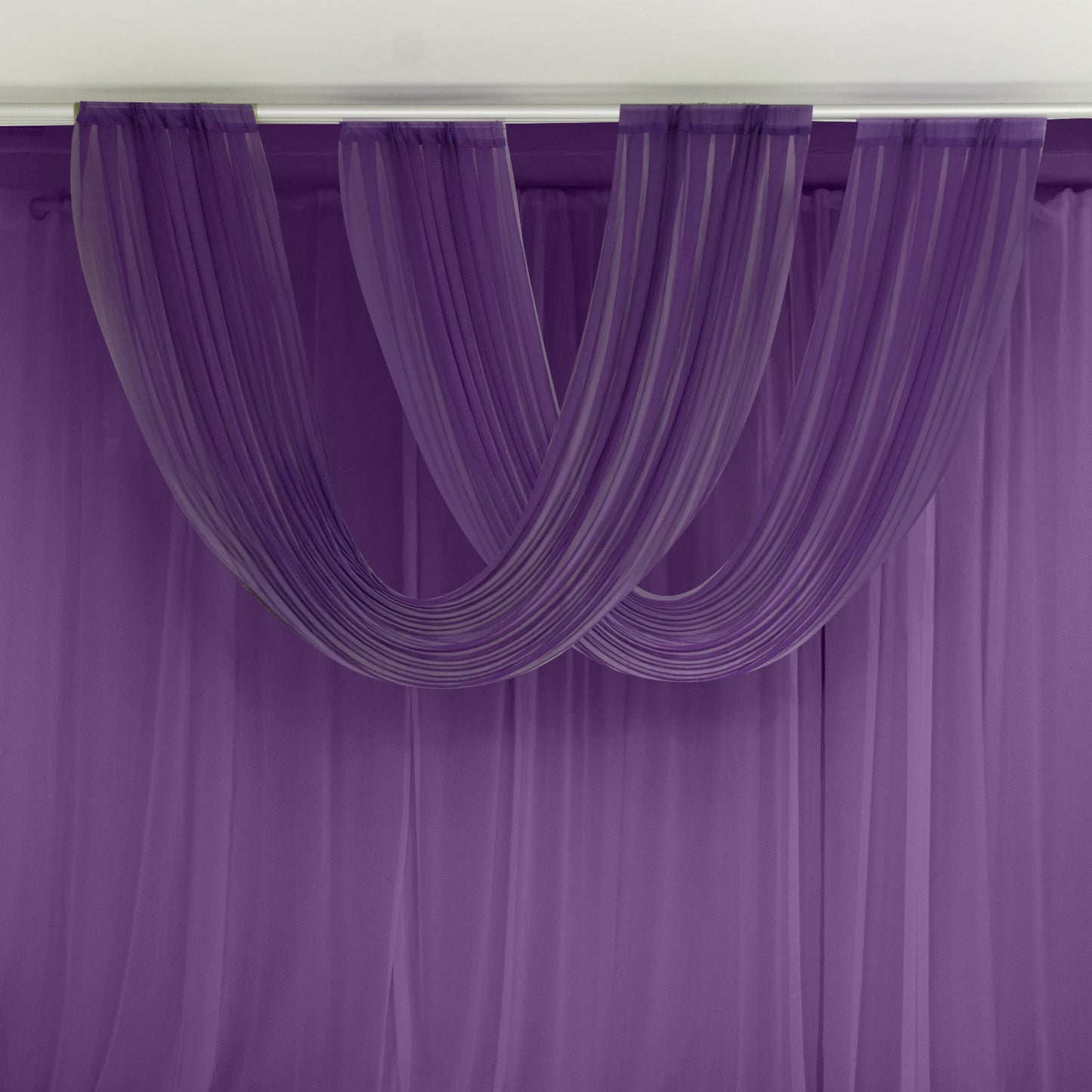 Purple sheer chiffon valance curtain draped elegantly on a rod.