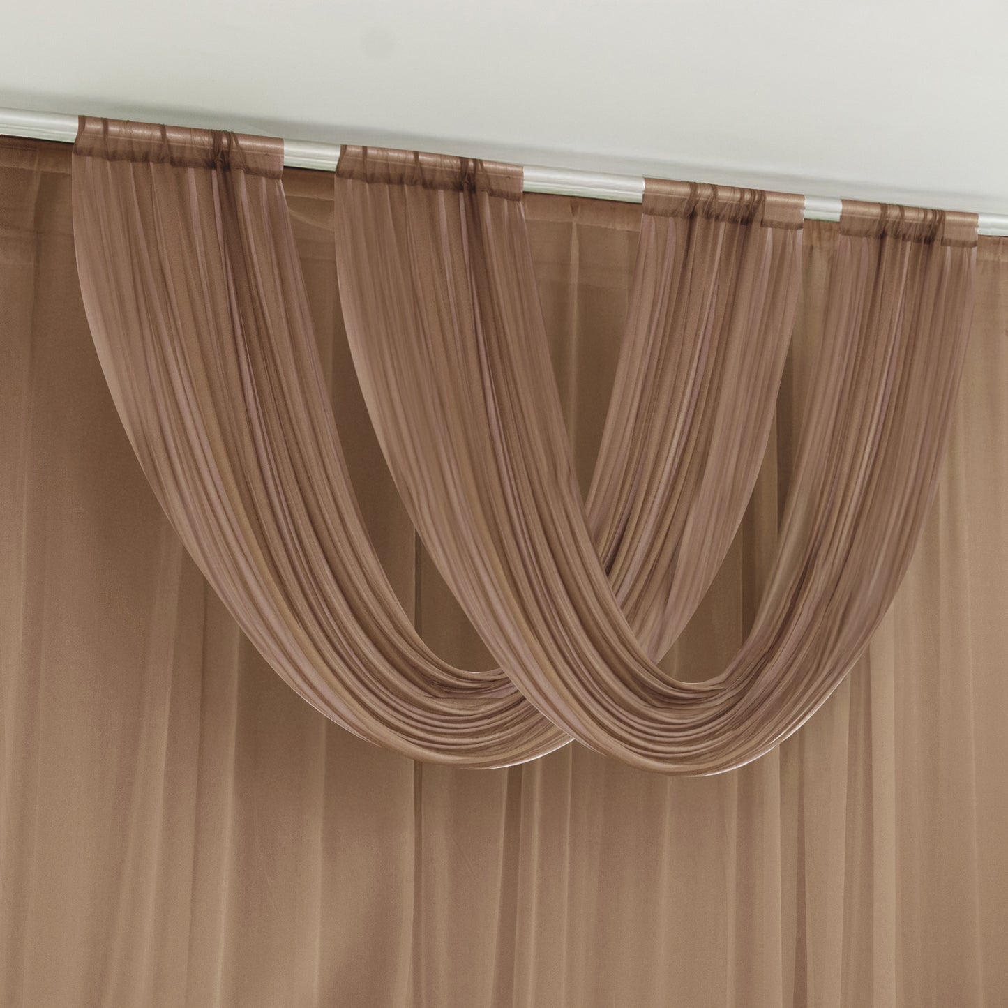Taupe sheer chiffon valance curtain draped elegantly.