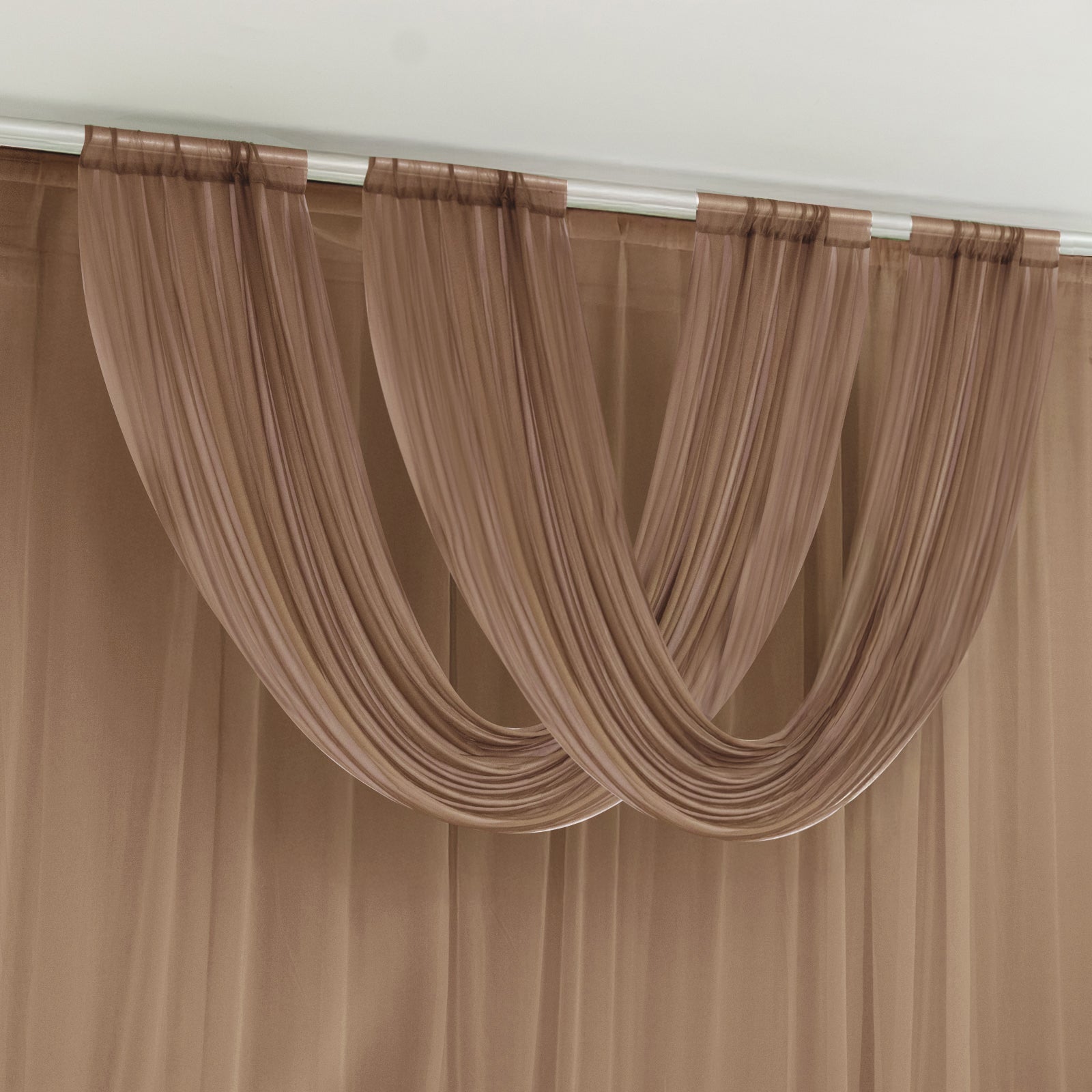 Taupe sheer chiffon valance curtain draped elegantly.