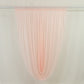 Blush draped sheer fabric for elegant home decor and event styling.