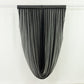Black pleated curtain hanging elegantly
