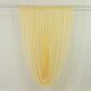 Champagne sheer chiffon valance curtain draped elegantly.