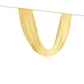 Champagne sheer chiffon valance curtain draped elegantly on a rod.