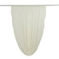 Ivory sheer chiffon valance curtain draped on a rod.