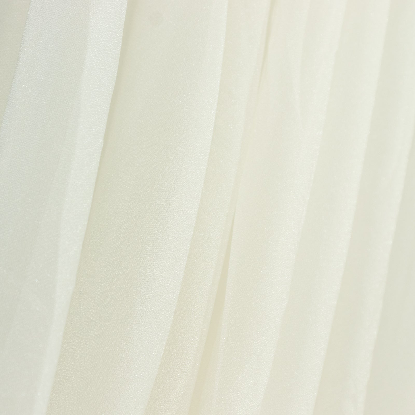 Ivory sheer chiffon valance curtain drape for wedding arch backdrop.