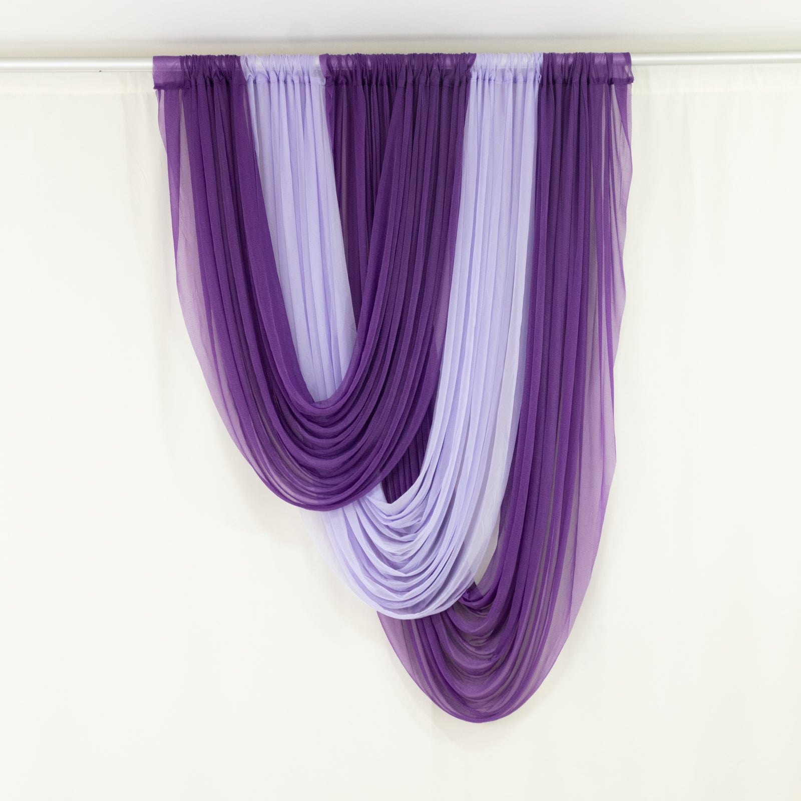 Lavender Lilac draped curtains adding elegance to any space.