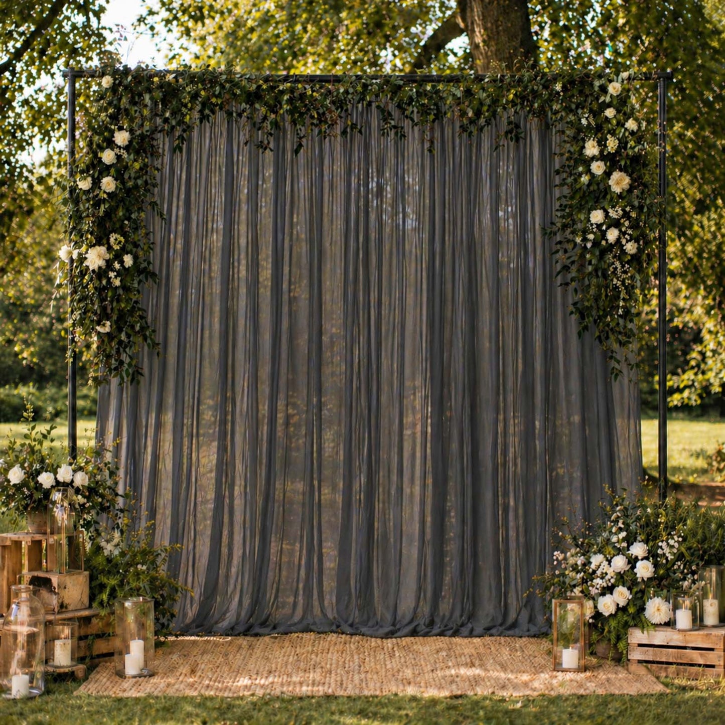 Black chiffon backdrop curtain panel with sheer draping fabric.