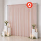 Pink sheer flame retardant curtain backdrop with candles and floral decor