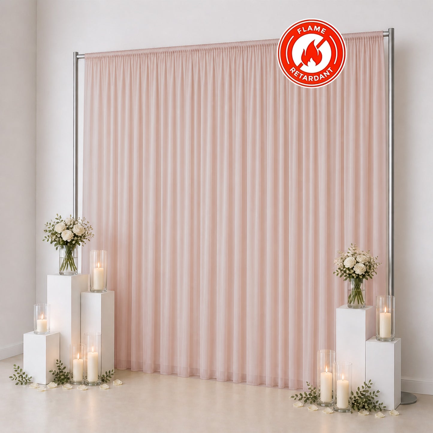 Pink sheer flame retardant curtain backdrop with candles and floral decor