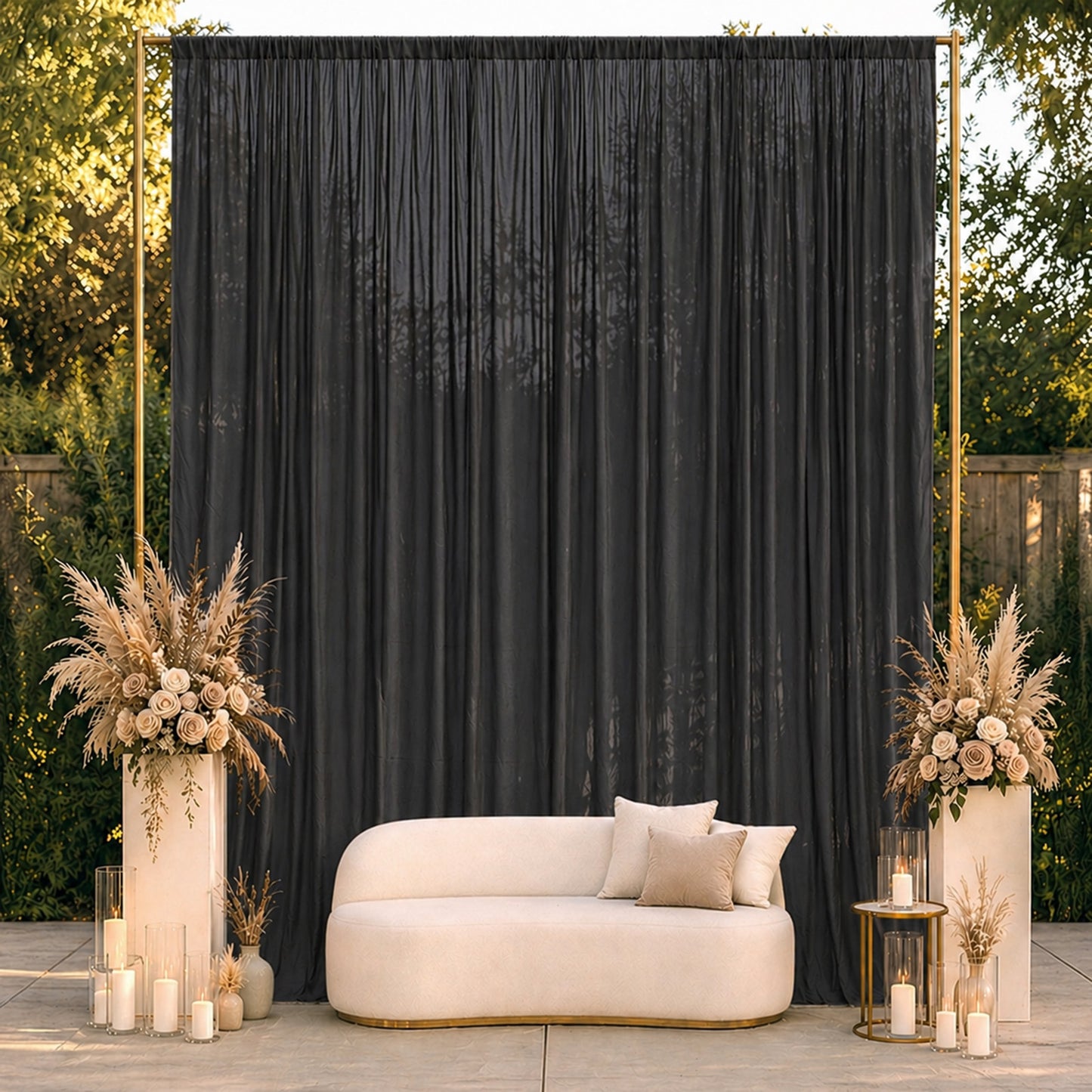 Black chiffon backdrop curtain panel in a decorative setting.