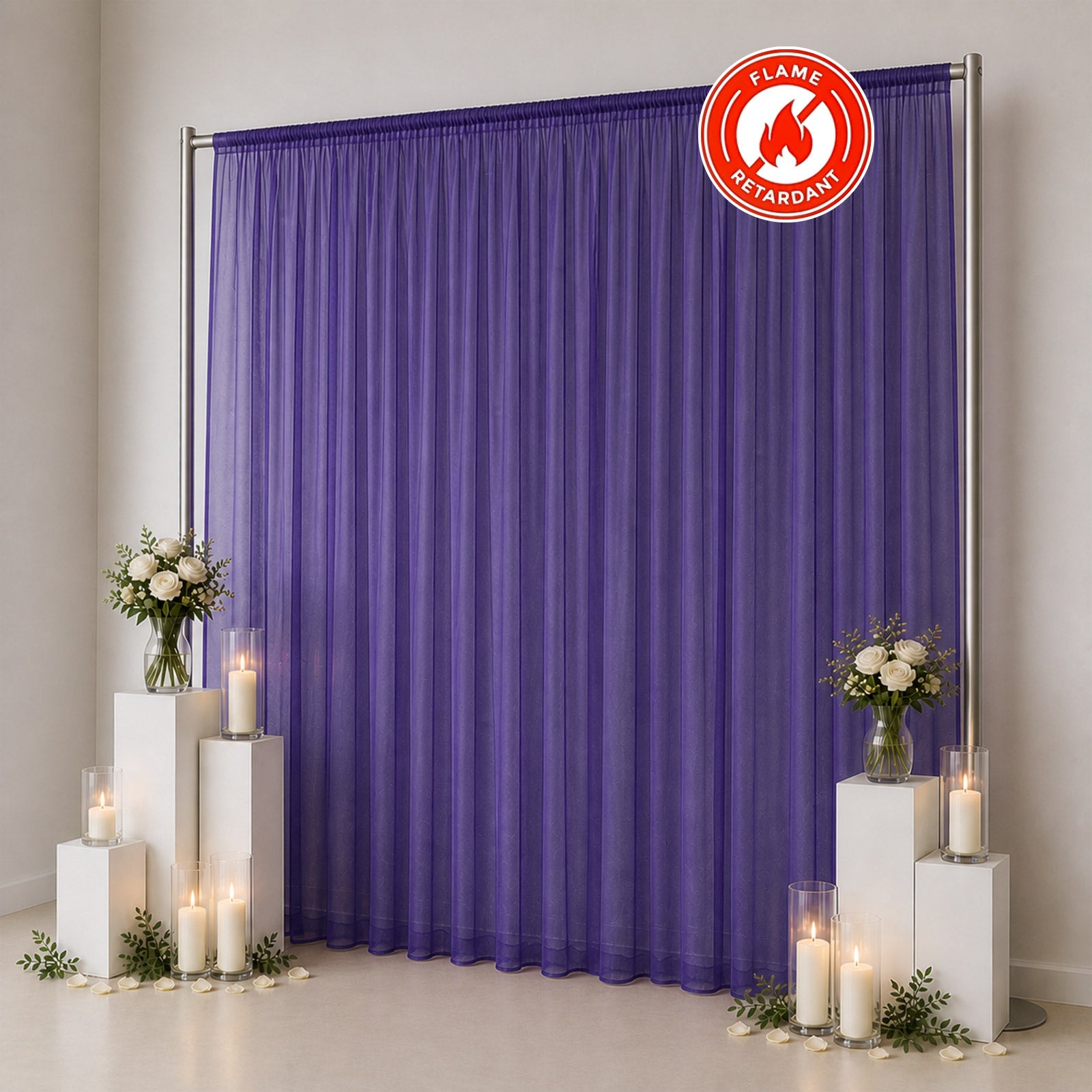 Purple flame retardant sheer curtain backdrop with candles and floral decor