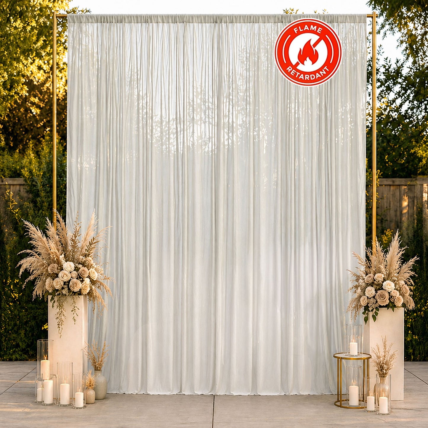 Silver chiffon backdrop curtain panel in a serene outdoor setting.