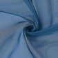Navy blue chiffon fabric, soft and sheer, ideal for drapery and backdrops.
