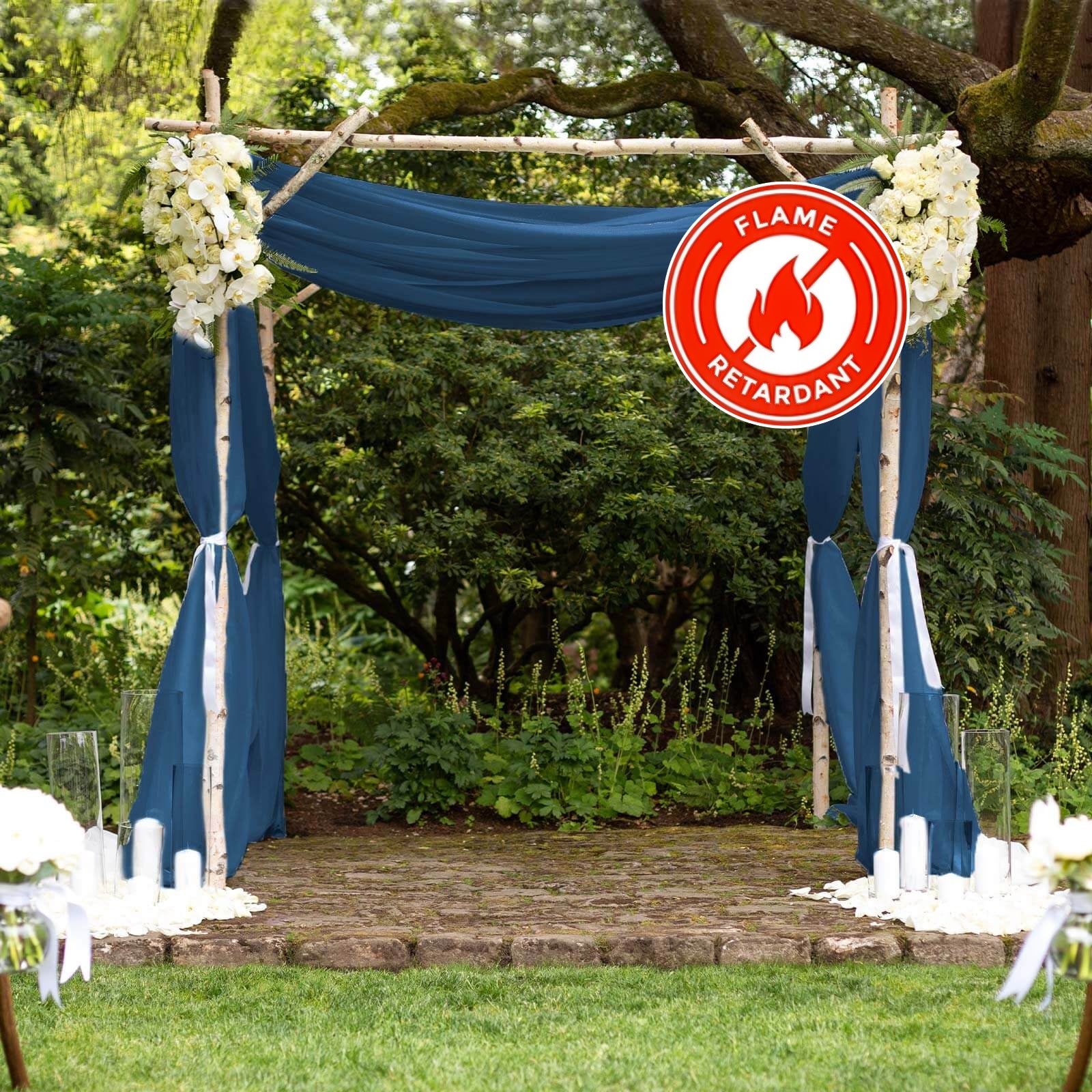 Navy blue chiffon curtain panel with flame-resistant backdrop drapery.