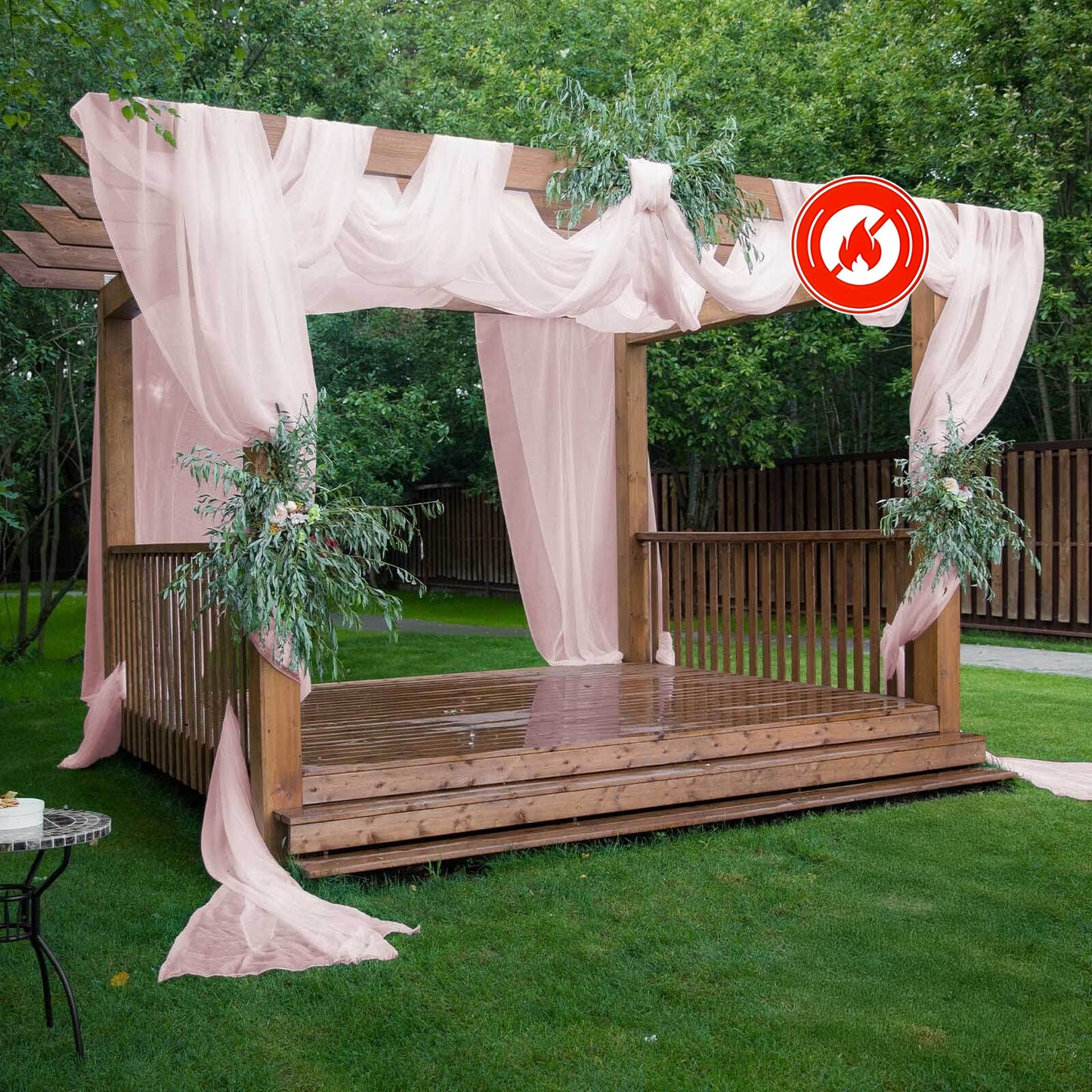 Blush chiffon curtain panel backdrop drapery for outdoor decor.