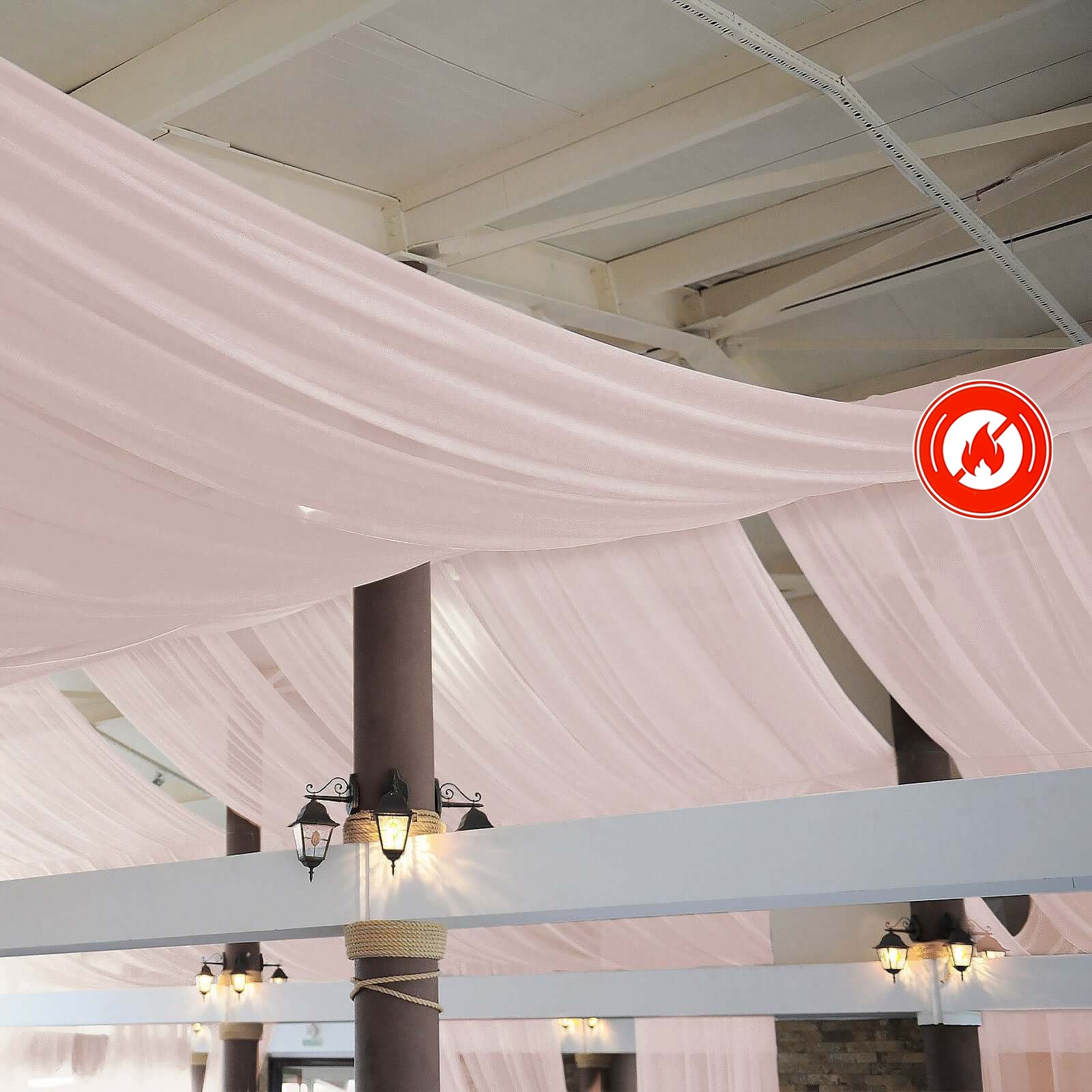 Blush chiffon curtain panel drapery for elegant ceiling decor.