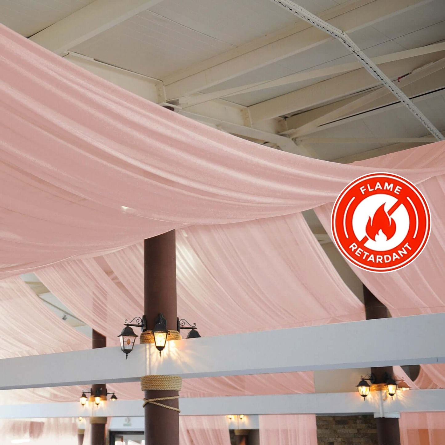 Dusty rose chiffon curtain panel, durable flame-resistant backdrop drapery.