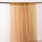 Gold chiffon curtain panel, durable flame-resistant backdrop drapery.