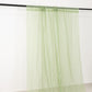 5ftx32ft sage green chiffon curtain panel hanging from a rod.