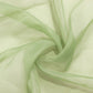 Sage green chiffon curtain panel, durable flame resistant backdrop drapery.
