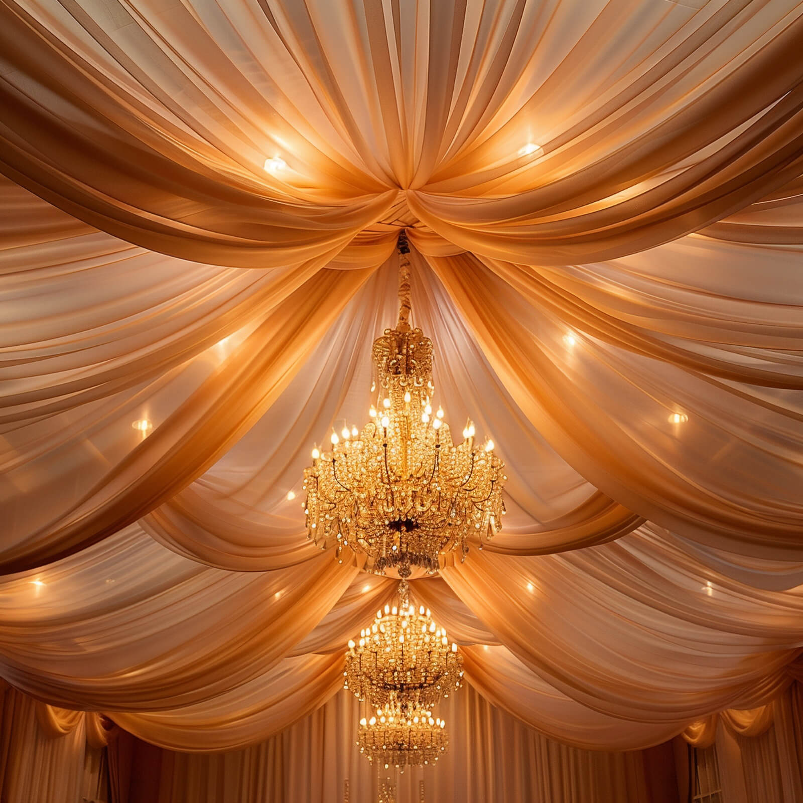 Terracotta chiffon curtain panel draping ceiling with elegant chandeliers.