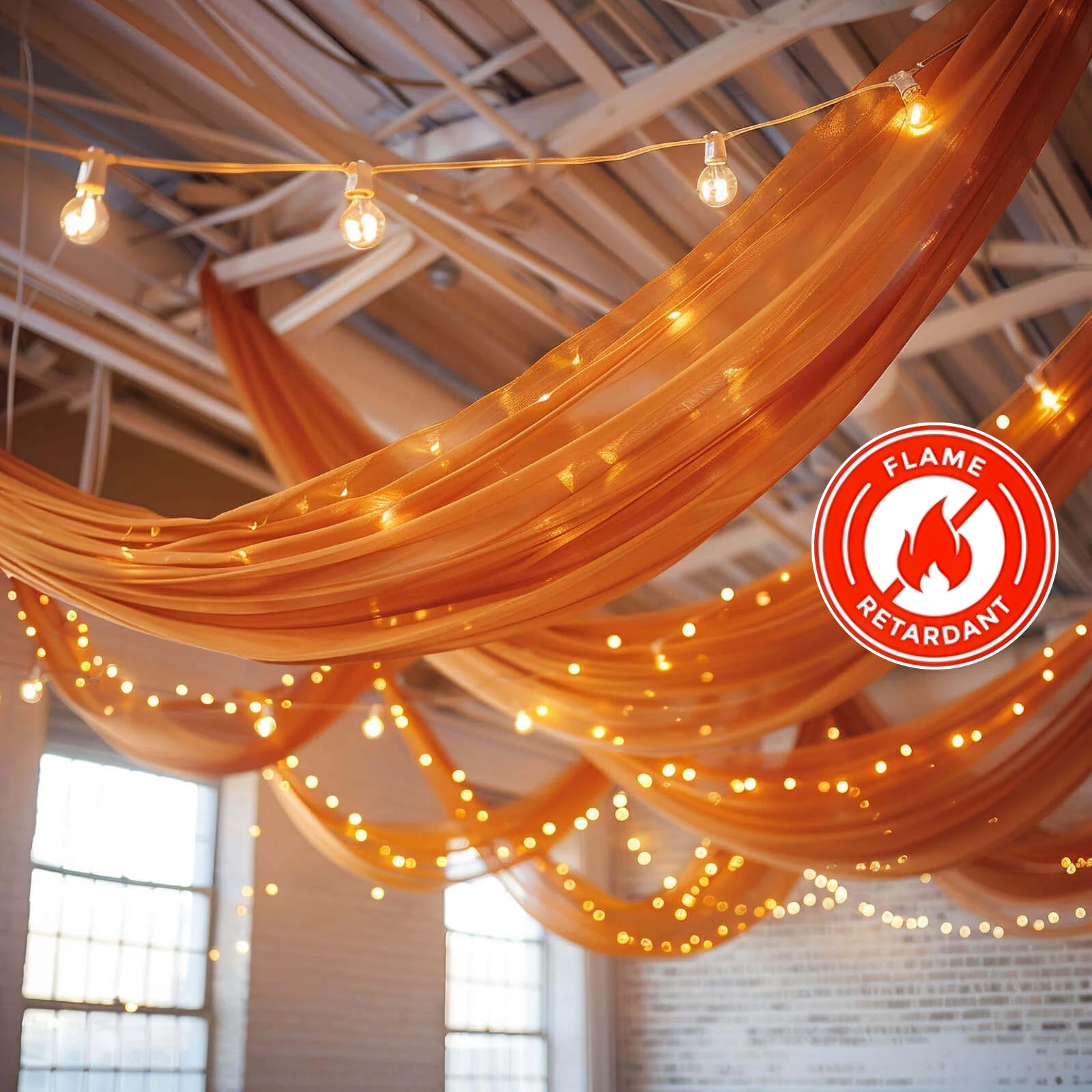Terracotta chiffon curtain panel draping with lights for event decoration.