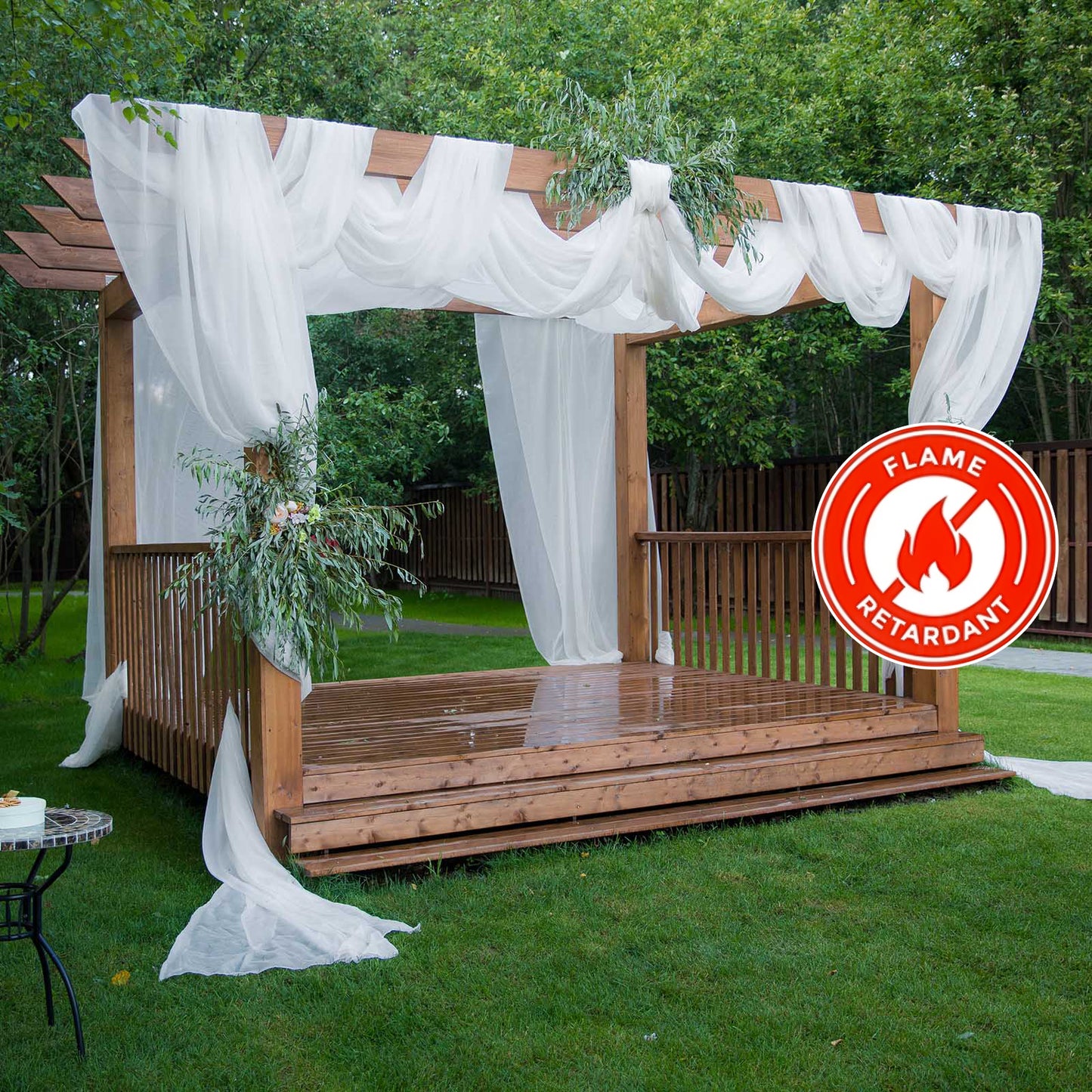 White chiffon curtain panel for backdrop drapery. Flame resistant and durable.