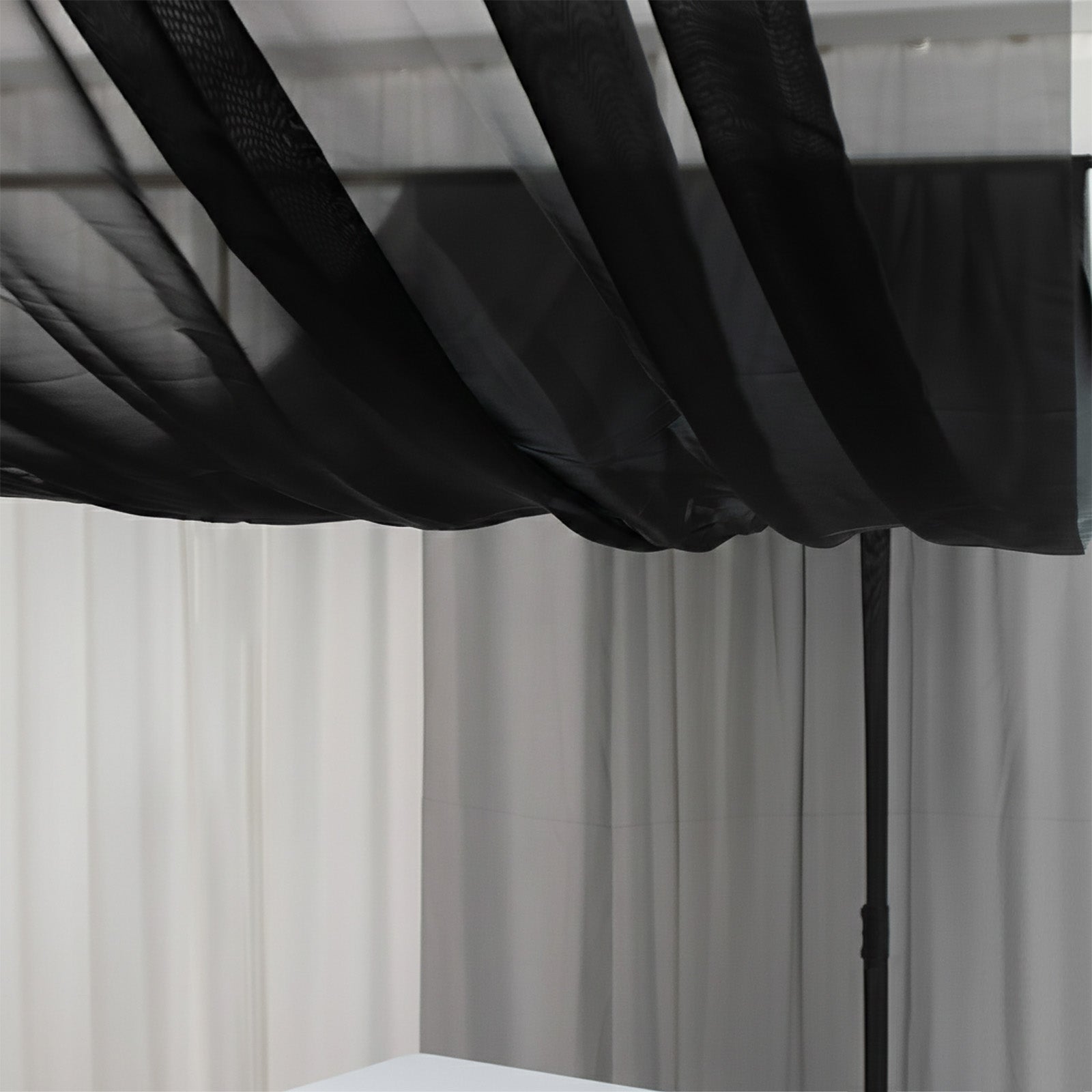 Black chiffon curtain panel, durable flame-resistant backdrop and ceiling drape.